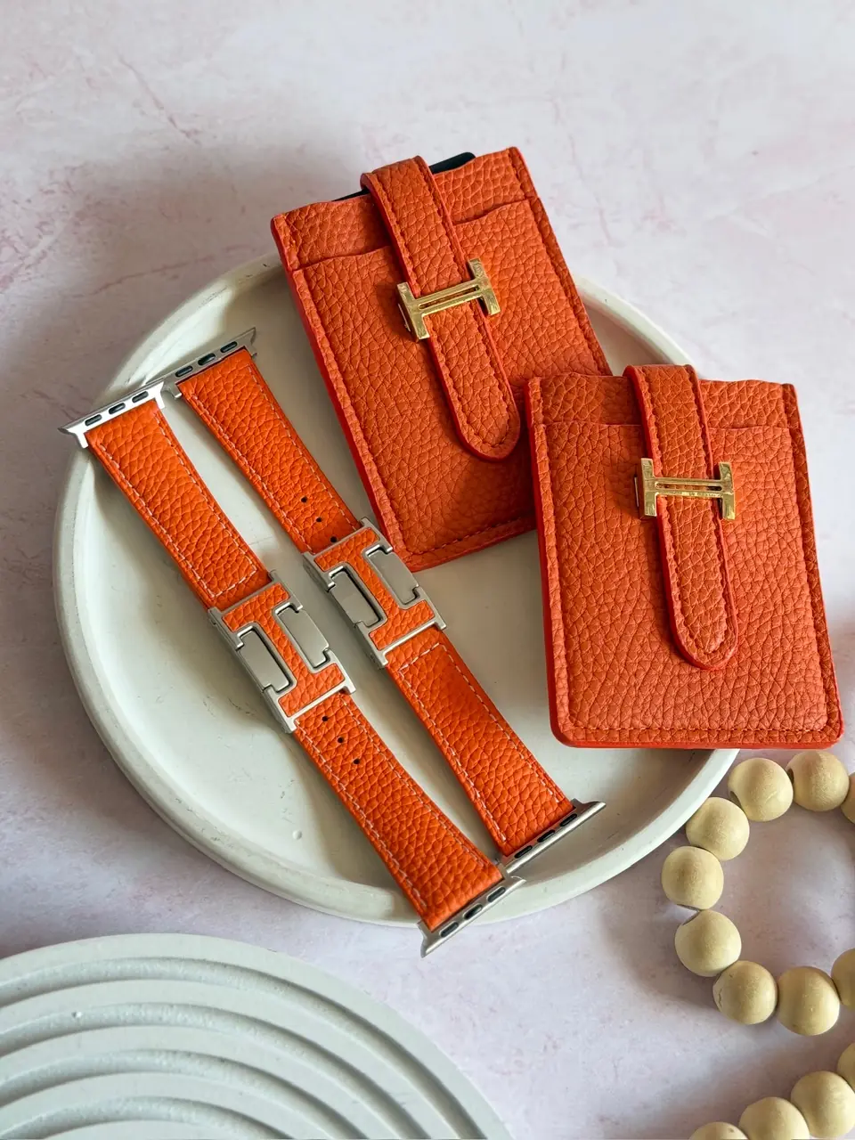 c3e72e بند اپل واچ چرمی هرمس نارنجی با قفل طرح هرمس (کدw5075) - تصویر 1